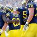 Michigan junior quarterback Denard Robinson congratulates sophomore wide reciever Drew Dileo after Dileo scored a touchdown during the third quarter against Eastern Michigan at Michigan Stadium on Saturday. Melanie Maxwell I AnnArbor.com